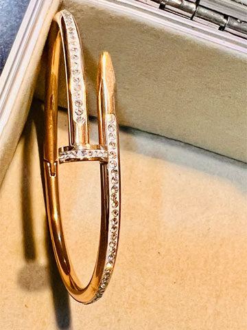 AD studded nail curved kada