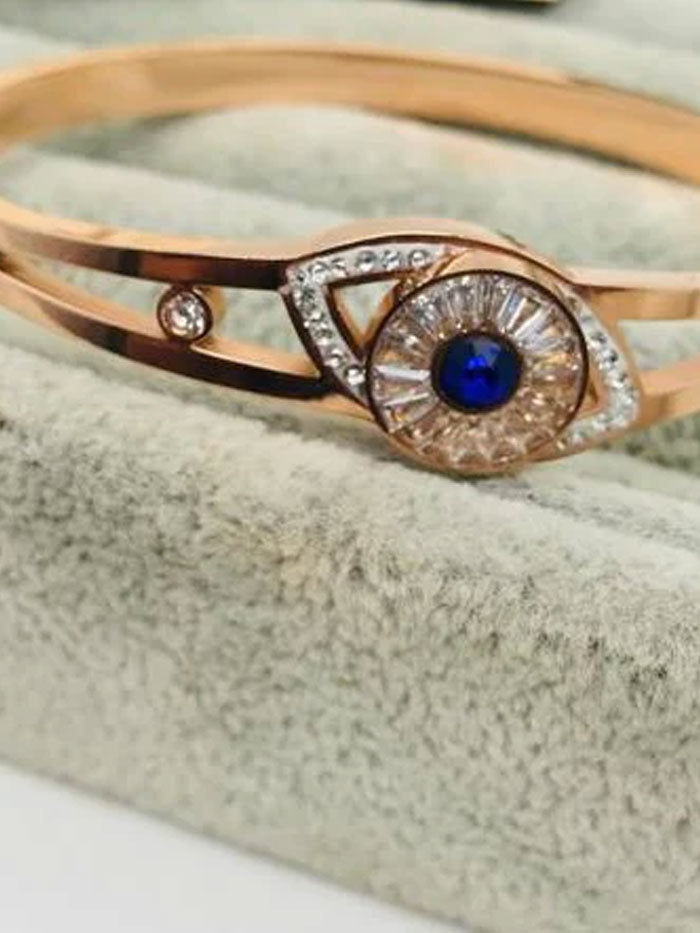 Evil eye crystal and blue stone studded bracele